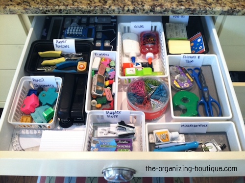This is how I organized a client's office drawers without buying anything new and using plastic organizers she already had.