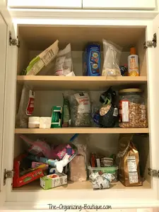 I helped a client organize her kitchen pantry storage cabinet, and she loves it. Come check out the before and after photos as well as the products we used!