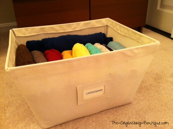 organize cardigans for women & men in open canvas storage bins