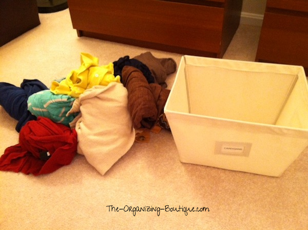 organize cardigans for women & men in open canvas storage bins