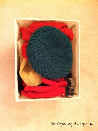organize hats and gloves in home storage bins