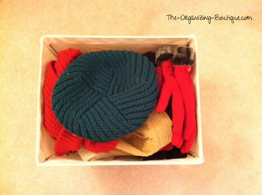 organize hats and gloves in home storage bins