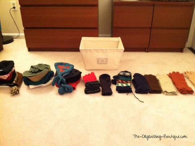 organize hats and gloves in home storage bins